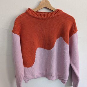 Arthur Apparel pink and orange squiggle sweater